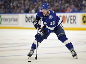 Tampa Bay Lightning left wing Ondrej Palat (18) controls the puck against the Colorado Avalanche on June 22, 2022, in Tampa, Fla.