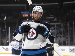 Winnipeg Jets center Pierre-Luc Dubois reacts after scoring a goal in the first period of the team's NHL hockey game against the Los Angeles Kings on Thursday, Oct. 28, 2021 in Los Angeles.