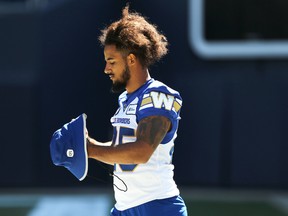 Winnipeg Blue Bombers defensive back Tyrell Ford adjusts his hat at practice on Thursday, June 23, 2022.