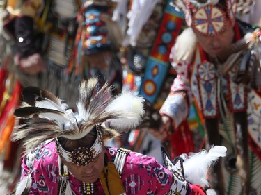 Dancers at a powwow at The Forks in Winnipeg on Friday, July 1, 2022.