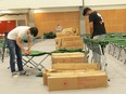 Volunteers set up the Canadian Red Cross shelter at the Axworthy Health and RecPlex at the University of Winnipeg on Saturday, July 16, 2022. The shelter is not yet operational but may soon be in use to support people evacuating from Mathias Colomb Cree Nation in northern Manitoba.