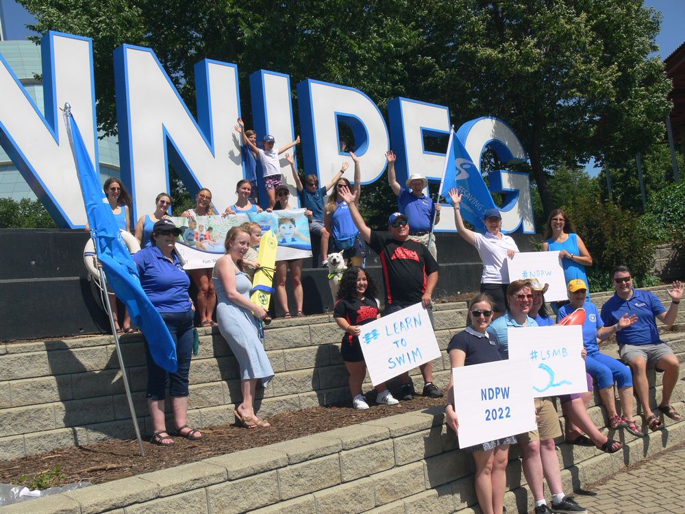 Winnipeg Sign at Forks lit up to mark Drowning Prevention Week