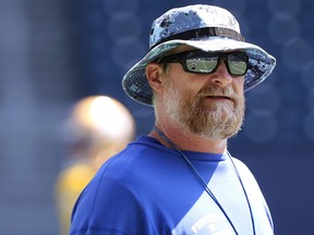 Head coach Mike O'Shea sports a bucket hat and sunglasses during Winnipeg Blue Bombers practice in Winnipeg on Tuesday, July 26, 2022.