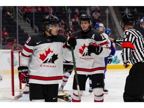 Team Canada's Logan Stankoven (10) celebrates a goal with teammates during World Junior Hockey Championship action at Rogers Place in Edmonton, on Thursday, Aug. 11, 2022.