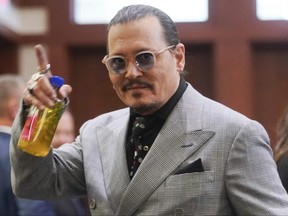 Johnny Depp appears in the courtroom during a break at the Fairfax County Circuit Courthouse in Fairfax, Va., May 19, 2022.
