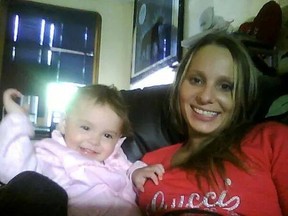 Cara Lynn Hiebert, seen here with one of her children, was 31-years-old and a mother of four, when construction workers discovered her badly beaten body in the basement of her home at 506 Redwood Ave., on July 19, 2011.