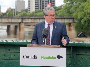 Federal Minister of Northern Affairs and Winnipeg MP Dan Vandal speaks at a funding announcement at The Forks in Winnipeg on Wednesday, Aug. 3.