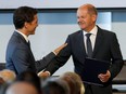 Prime Minister Justin Trudeau and Germany's Chancellor Olaf Scholz attend the Canada-Germany Business Forum, in Toronto, Aug. 23, 2022.