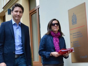 Prime Minister Justin Trudeau and Canada's ambassador to Ukraine Larisa Galadza attend the reopening of the Canadian embassy in Kyiv, Ukraine on Sunday, May 8, 2022.THE CANADIAN PRESS/CBC News/Pool/Murray Brewster