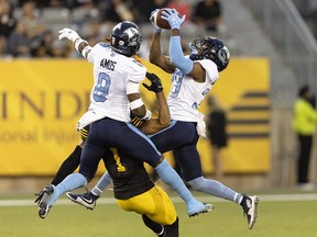 Toronto Argonauts defensive back Maurice Carnell IV (39) makes an interception during CFL action against the Hamilton Tiger-Cats in Hamilton, Ont. on Friday, August 12, 2022.