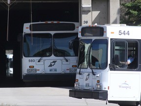 A Winnipeg Transit bus arrives at a Transit garage in Winnipeg.