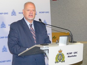 Manitoba Justice Minister Kelvin Goertzen addresses the media at Manitoba RCMP headquarters in Winnipeg on Tuesday to announce the Manitoba government is expanding the Criminal Property Forfeiture (CPF) branch as part of its ongoing efforts to combat organized crime and money-laundering activities.