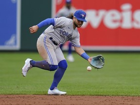 Blue Jays shortstop Bo Bichette fields a groundout by Orioles' Ryan Mountcastle during the third inning of the second game of a baseball doubleheader.
