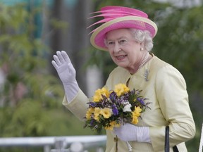 Queen Elizabeth II waves as she arrives at The Forks during a visit at The Forks in Winnipeg  in 2010. The Queen died Thursday, Sept. 8 at the age of 96.