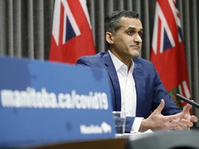 Dr. Jazz Atwal, Manitoba deputy chief provincial public health officer, speaks at a press conference at the Manitoba legislature in Winnipeg on March 5, 2020. Atwal says eligibility for the new COVID-19 vaccine will be expanded to all adults in a few weeks as more shipments arrive.