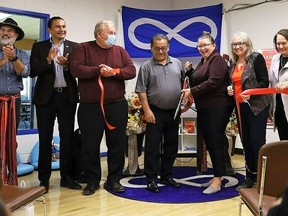 Manitoba Métis Federation officials joined NDP leader Wab Kinew, second from left, in St. Laurent for a ribbon cutting on Tuesday to celebrate the grand opening of the Li Pchi Pwayson School Age Centre. Courtesy: Manitoba Métis Federation