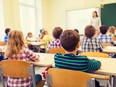 Students at their desks in a classroom