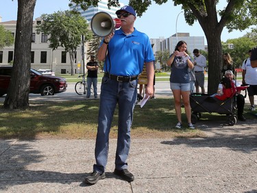Jeff Trager, president of United Food and Commercial Workers Local 832, speaks at Memorial Park ahead of the Labour Day March in Winnipeg on Monday, Sept. 5, 2022.