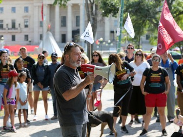 Gord Delbridge, president of the Canadian Union of Public Employees Local 500, speaks at Memorial Park ahead of the Labour Day March in Winnipeg on Monday, Sept. 5, 2022.