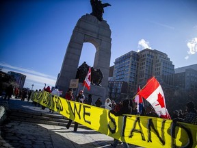 Freedom Convoy protesters gather in downtown Ottawa on Sunday, Feb. 13, 2022, on day 17 of the protest. ASHLEY FRASER, POSTMEDIA