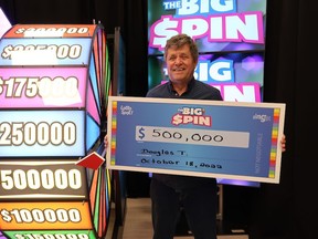Winnipeg man Douglas Taylor spun to win $500,000 from a scratch ticket he got for his birthday.