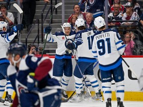 Sam Gagner #89 of the Winnipeg Jets celebrates after a first period power play goal against the Colorado Avalanche.