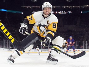 UNIONDALE, NEW YORK - MAY 20: Sidney Crosby #87 of the Pittsburgh Penguins skates against the New York Islanders in Game Three of the First Round of the 2021 Stanley Cup Playoffs at the Nassau Coliseum on May 20, 2021 in Uniondale, New York. The Penguins defeated the Islanders 5-4. (Photo by Bruce Bennett/Getty Images)