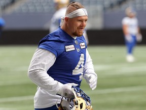 Winnipeg Blue Bombers linebacker Adam Bighill on the sideline during practice on Wed., Oct. 12, 2022.