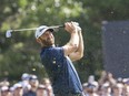 Sep 4, 2022; Boston, Massachusetts, USA; Dustin Johnson captain of team Aces tees off on the 17th during the final round of the LIV Golf tournament at The International.