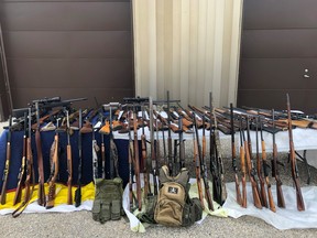 As part of an investigation into unlawful possession of firearms, Lac du Bonnet RCMP, along with the assistance of National Weapons Enforcement Support Team, executed a search warrant at a residence in the RM of Reynolds on Wednesday. Officers seized over 80 firearms and a large amount of ammunition.