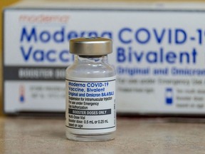 a vial of the Moderna Covid-19 vaccine, Bivalent. RINGO CHIU/AFP via Getty Images