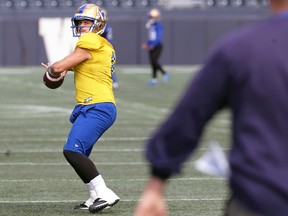 Quarterback Zach Collaros throws during Winnipeg Blue Bombers practice in Winnipeg on Tuesday, Oct. 4, 2022.