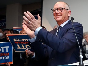 Scott Gillingham applauds after being elected the mayor at the Clarion Hotel in Winnipeg on Wed., Oct. 26, 2022.