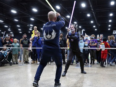 River City Jedi members locked in a lightsabre duel during Winnipeg Comiccon at the RBC Convention Centre on Sunday, Oct. 30, 2022.