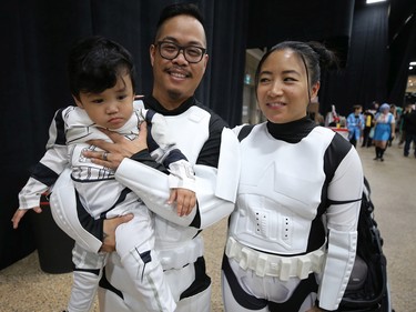 A family of stormtroopers pose at Winnipeg Comiccon at the RBC Convention Centre on Sunday, Oct. 30, 2022.