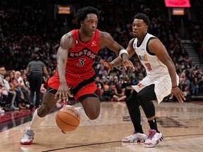 Toronto Raptors forward O.G. Anunoby (left) drives to the net past Miami Heat guard Kyle Lowry Scotiabank Arena on Nov. 16.