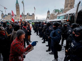 Police move in to clear downtown Ottawa on Feb. 19.