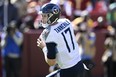 Ryan Tannehill of the Tennessee Titans attempts a pass during the first quarter against the Washington Commanders at FedExField on October 09, 2022 in Landover, Maryland.