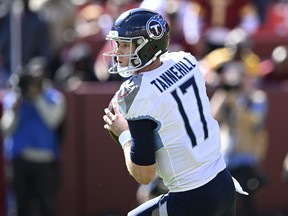 Ryan Tannehill of the Tennessee Titans attempts a pass during the first quarter against the Washington Commanders at FedExField on October 09, 2022 in Landover, Maryland.