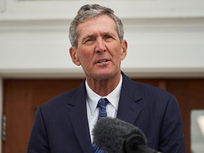 Manitoba Premier Brian Pallister makes an announcement in front of the Dome Building in Brandon, Man., Tuesday, Aug. 10, 2021.