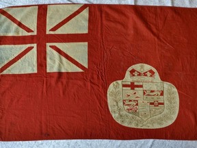 A Red Ensign flag is seen in an undated handout photo. The 80th anniversary of ill-fated battle of Dieppe will be commemorated during this year's national Remembrance Day ceremony with a mysterious flag that was supposedly carried into battle by a Canadian killed in the attack.