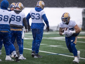 Winnipeg Blue Bombers running back Brady Oliveira (20) carries the ball during practice at Leibel Field before the 109th Grey Cup on Wednesday, Nov. 16, 2022 in Regina.