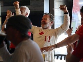 Fans celebrate the first World Cup goal scored by Canada, against Croatia, during a watch party at Nicolino's Restaurant on Pembina Highway in Winnipeg, on Sunday, Nov. 27, 2022.