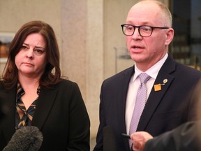 Premier Heather Stefanson and Mayor Scott Gillingham speak to reporters at Winnipeg city hall on Thursday, Dec. 8. The pair of leaders announced that Waste Connections agreed to pause operations of Prairie Green landfill in Rosser.