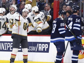 Dec 13, 2022; Winnipeg, Manitoba, CAN; Vegas Golden Knights right wing Mark Stone (61) celebrates his second period goal against the Winnipeg Jets at Canada Life Centre. Mandatory Credit: James Carey Lauder-USA TODAY Sports