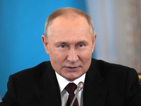 TRUST ME: NRussian President Vladimir Putin attends an informal meeting of the Commonwealth of Independent States' (CIS) leaders in St. Petersburg, Russia, Oct. 7, 2022.