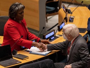 Permanent Representative and Ambassador of the United States Linda Thomas-Greenfield (left) shakes hands with Permanent Representative and Ambassador of Canada Bob Rae (right) during the 5th plenary meeting of the Economic and Social Council regarding the removal of the Islamic Republic of Iran from membership in the Commission on the Status of Women, at the United Nations headquarters in New York City, Wednesday, Dec. 14, 2022.