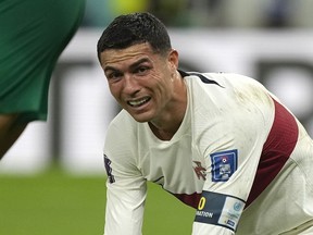 Portugal's Cristiano Ronaldo reacts after missing an opportunity to score during the World Cup quarter-final soccer match between Morocco and Portugal, at Al Thumama Stadium in Doha, Qatar, Saturday, Dec. 10, 2022.