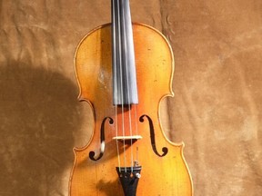 A violin that belonged to a Holocaust victim and was saved through a courageous act of friendship and remembrance will continue to share its story on display at the Canadian Museum for Human Rights in Winnipeg. Fanny Hecht was a Jewish violinist who was murdered along with her entire family by the Nazis during the Holocaust. In 1943, knowing the threat she was facing, Hecht asked her friend, neighbour and fellow violinist Helena Visser to save her violin if she was taken. Visser did just that, sneaking into the Hechts' apartment in Amsterdam after they were arrested by the Nazis and rescuing the violin. The Hecht violin was featured at a Dec. 3, 2022 performance by the Winnipeg Symphony Orchestra and will then be installed in the CMHR's Examining the Holocaust gallery for public viewing from Dec. 13 to March 13, 2023. It is on loan to the CMHR from Violins of Hope. Handout/Violins of Hope/CMHR