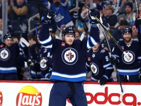 Winnipeg Jets defenceman Dylan Samberg (54) celebrates his first NHL goal in the second period against the Anaheim Ducks at Canada Life Centre in Winnipeg on Sunday, Dec. 4, 2022.